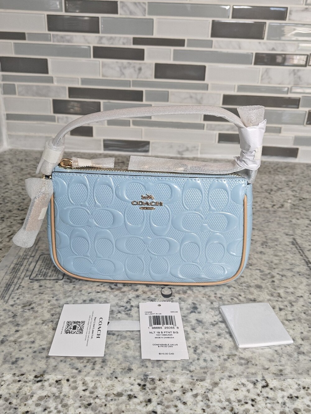 Coach Nolita 19 In Signature Leather With Charms (Light blue)